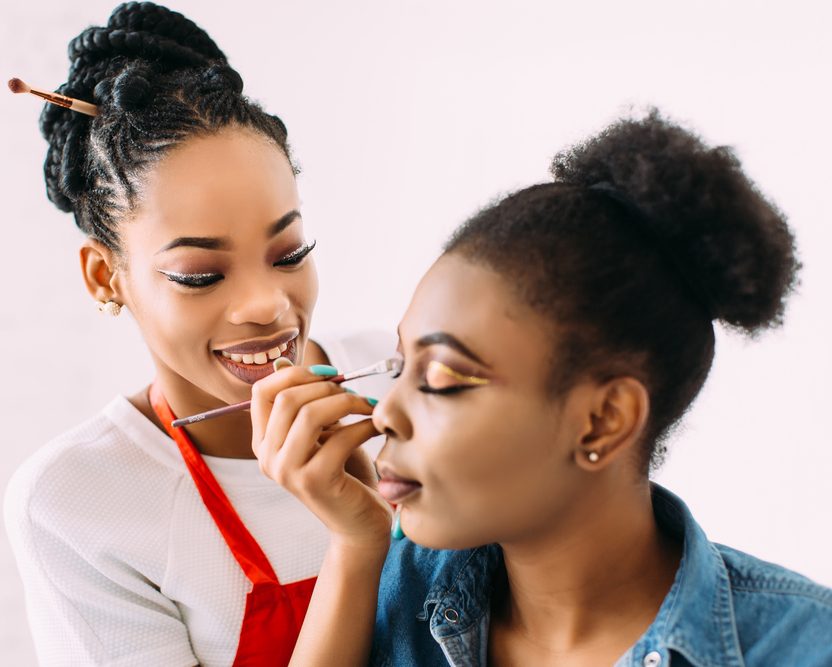 Makeup artist applying makeup